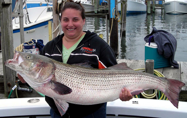 Angela with her First Big Striper