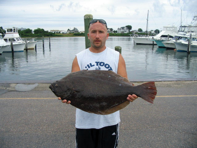 Kenny with an 11.8 lb Fluke