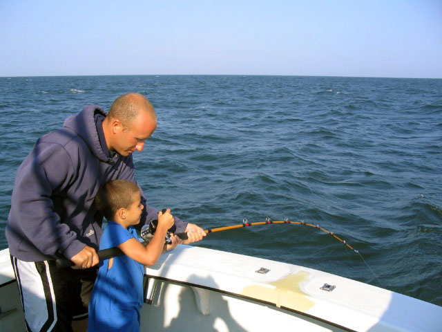 Mate Kenny Teaching a Youngster